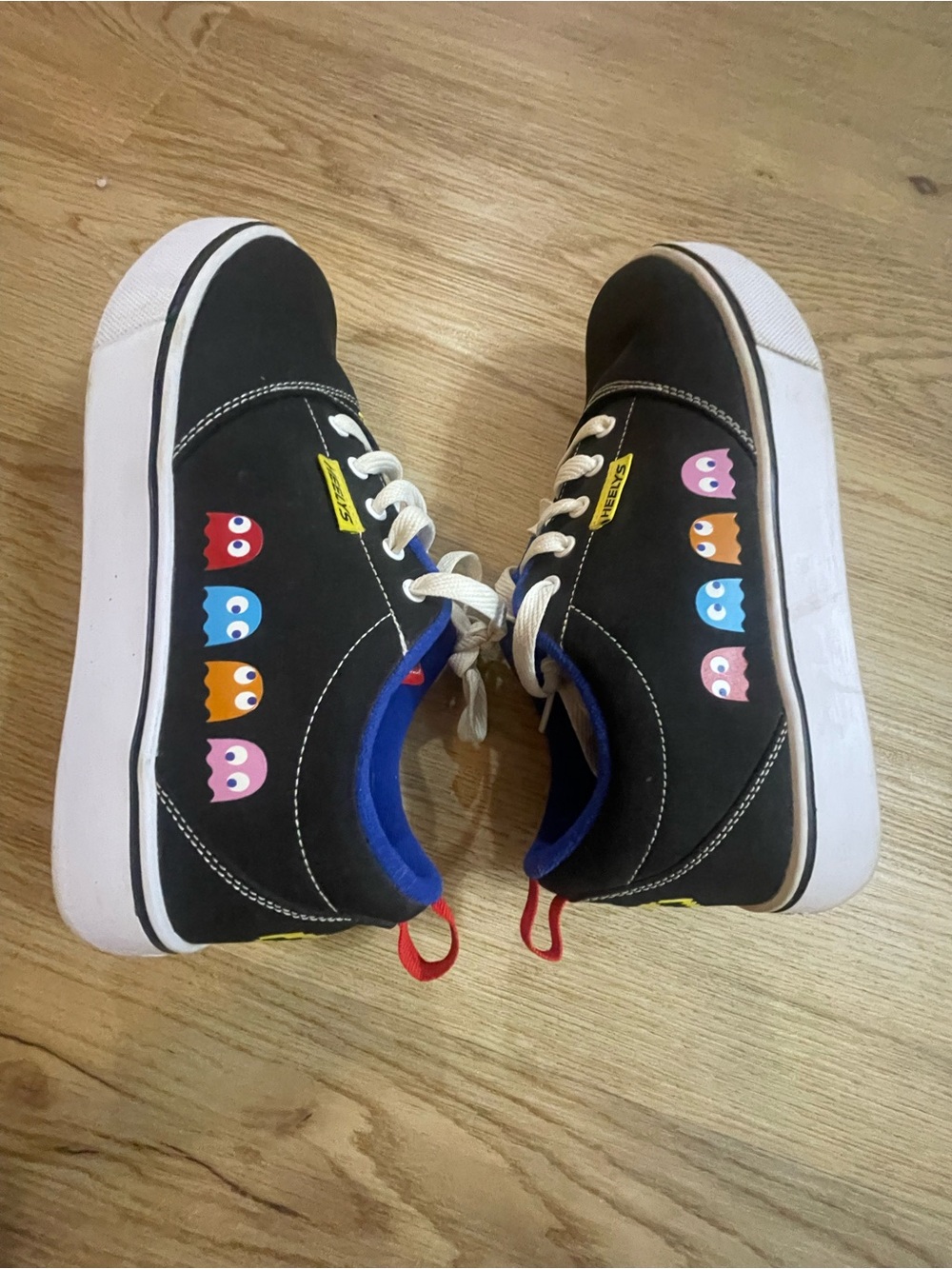 Heelys Black Sneakers with Red, Blue, Orange & Pink Ghost Accents